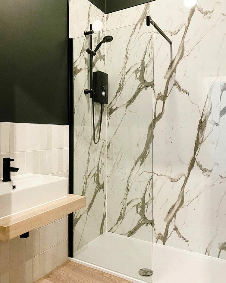 Marble Shower Wall and black brassware